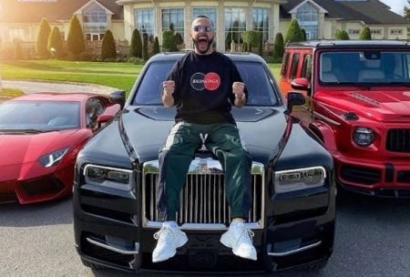 İnsanlara “iPhone”, “Ferrari”, dollar paylayan bloger - Azərbaycanlı Hüseyn bu qədər pulu haradan qazanır?